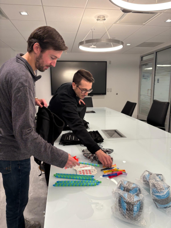 Our R&R Employees building sensory bags for upcoming events